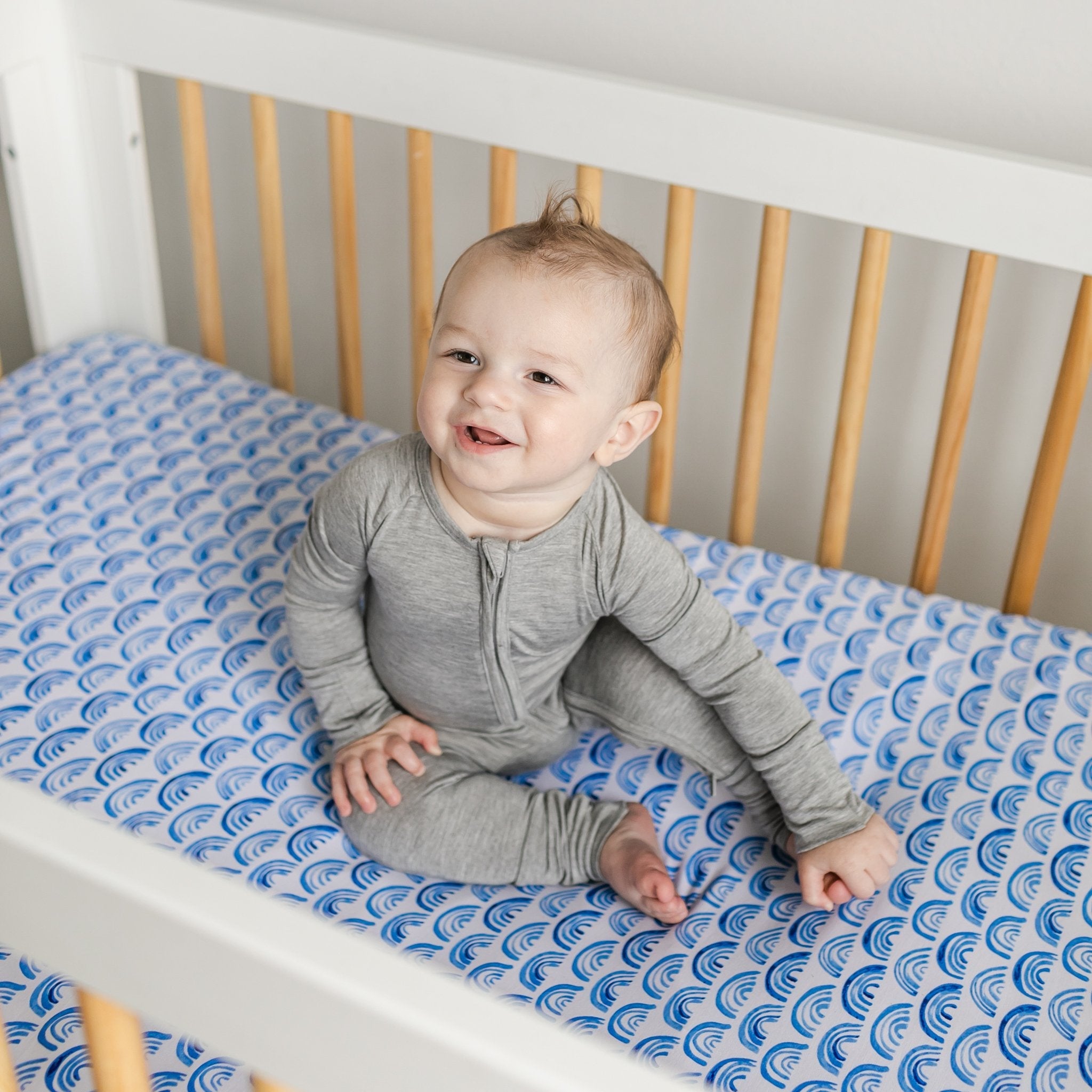 Blue Rainbows Fitted Crib Sheet